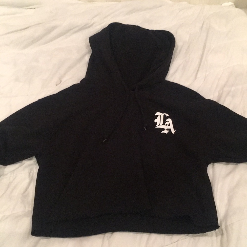 Black crop top hoodie, size M, says “LA”
